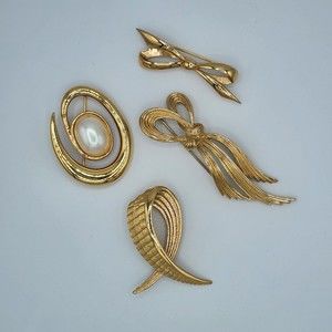 Set of 4 Signed Monet Gold Tone Brooch Pins